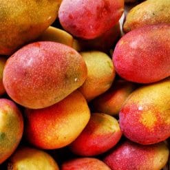 Bočica mirisnog ulja Mango Fruit s notama divlje jagode, naranče, manga, dinje, jasmina, maline i karamele.